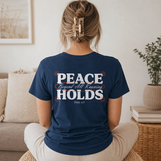 PEACE HOLDS BEYOND ALL KNOWING TEE- PHILLIPIANS 4:7